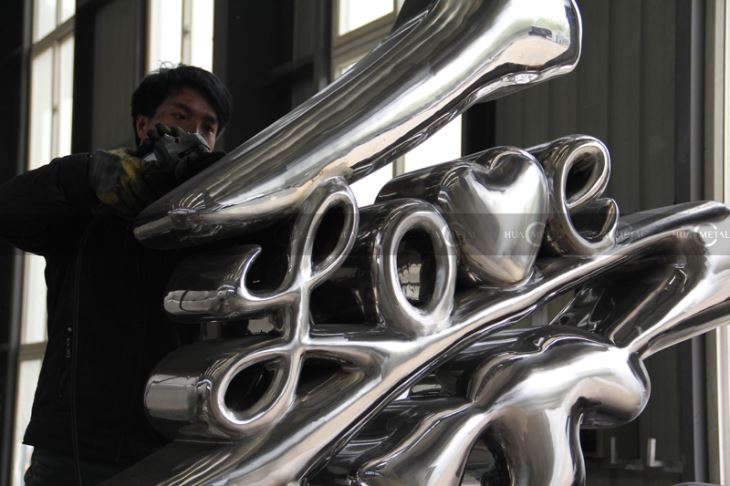 Hand-polished-1 Calligraphy-sculptures-Chromatic-coating-stainless-steel--Calligraphy-sculptures-artwork-foundry
